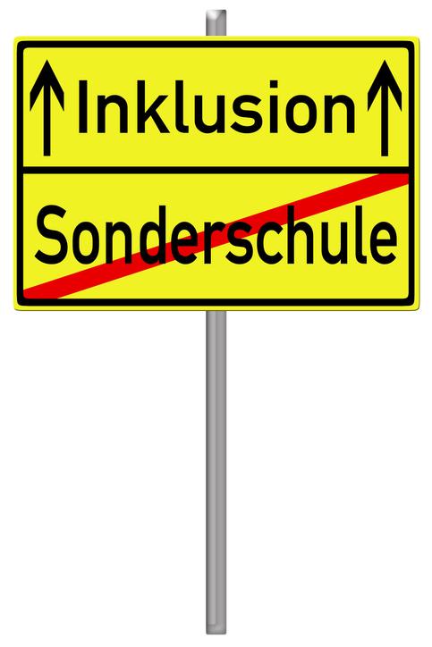 Sign with the german words inclusion and special school